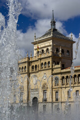Fototapeta premium View of the fonts of Zorrilla Square and the Royal cavalry academy in the background.