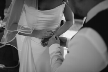 Groom and bride walking. This day is the first of many beautiful days together.