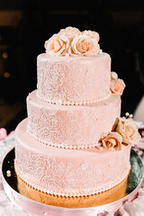 Obraz na płótnie Canvas Wedding cake with flowers for a wedding banquet. Delicious reception. Copy space. Celebration party concept. Trendy Cake.