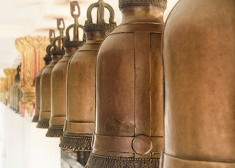 Fototapeta na wymiar Ritual bells in a Buddhist temple.