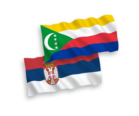 Flags of Union of the Comoros and Serbia on a white background