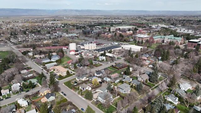 Cinematic 4K aerial drone pan shot of the Central Washington University campus city of Ellensburg, Kittitas County in Western Washington