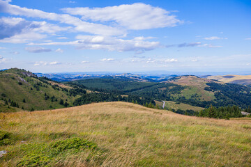 Summer Countryside Mountain Nature Landscape. Picturesque Scenery Green Hills And Fields. Beautiful Blue Sky With Clouds. Visually attractive View Of Mountain Kopaonik, Serbia, Europe.