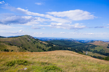 Summer Countryside Mountain Nature Landscape. Picturesque Scenery Green Hills And Fields. Beautiful Blue Sky With Clouds. Visually attractive View Of Mountain Kopaonik, Serbia, Europe.
