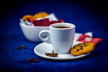 Delicious and healthy spicy tea with honey, cinnamon, anis and citrus. Tasty sweets and cake