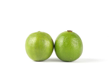 A close-up of limes isolated on white
