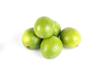 A close-up of limes isolated on white

