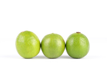 A close-up of limes isolated on white
