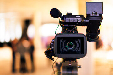 Camera filming professional device looking at camera