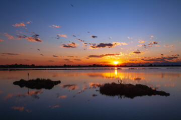Obraz na płótnie Canvas Sunset over Grado lagoon, Gorizia Italy