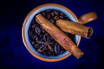 Delicious and healthy spicy tea with honey, cinnamon, anis and citrus. Tasty sweets and cake