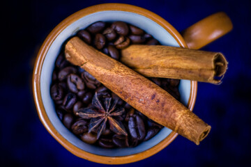 Delicious and healthy spicy tea with honey, cinnamon, anis and citrus. Tasty sweets and cake