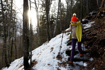 Mid Adult Woman Hiker Descending an Alpine Trail in Slovenia