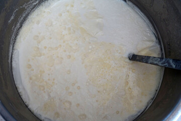 Natural cow's milk with plenty of fat, boiled to ferment yogurt,