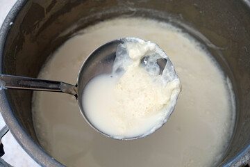 Fat milk cream on cooked milk, which is formed on natural cow's milk,