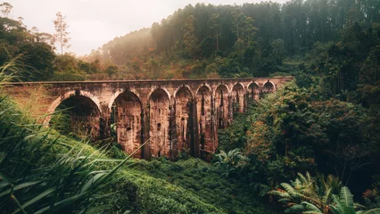 Gardinen Brücken old bridge in the mountains Nine Arch Bridge  © alesmartan