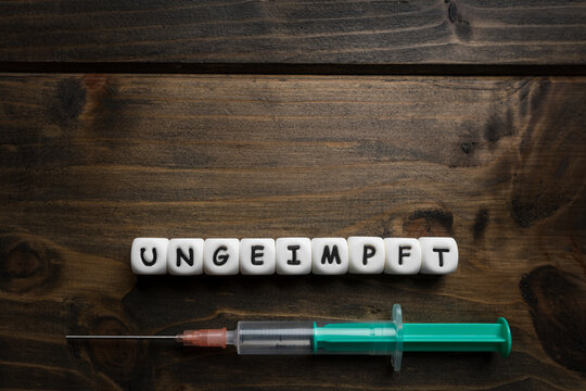 Corona virus Covid-19 vaccine text background in German