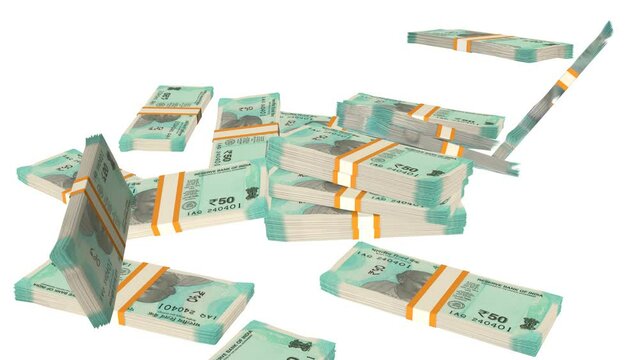 Many wads of money falling on table. 50 Indian Rupees banknotes. Stacks of money. Financial and business concept.
