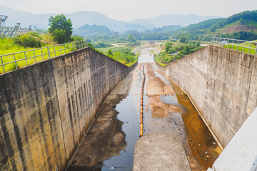 Drainage channels of large dams in dry season The water shortage. water resource management concept