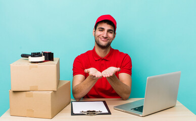 hispanic handsome man smiling happily with friendly and  offering and showing a concept. packer...