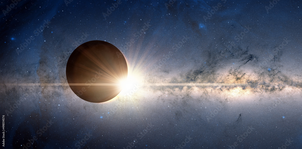 Wall mural solar eclipse with milky way galaxy in the background 