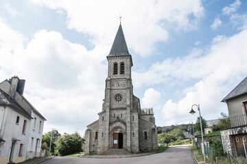 Fototapeta na wymiar typical and tradional village church in the French village of Montsauche-les Setton in the region Morvan