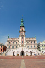 Fototapeta premium Zamosc, Poland - May 2010: View of the city center on a sunny day, City Hall
