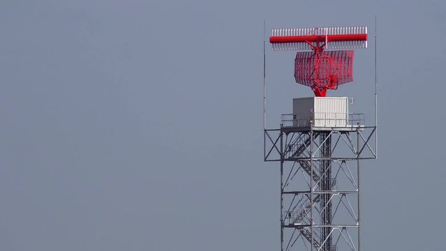 radar dish at an airfield, seamless loop.
