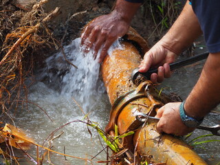 Repair work on broken pipes is being carried out by contractors
