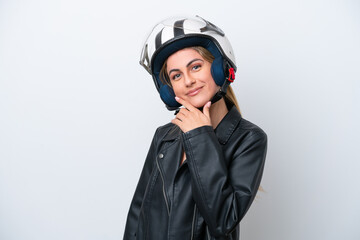 Young caucasian woman with a motorcycle helmet isolated on white background happy and smiling