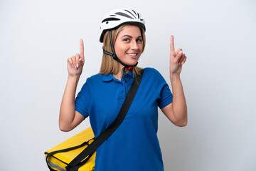 Young caucasian woman with thermal backpack isolated on white background pointing up a great idea