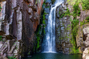 Fototapeta na wymiar Famous and paradisiacal waterfall of Veu da Noiva (Veil of the Bride) located in Serra do Cipo in the state of Minas Gerais, Brazil