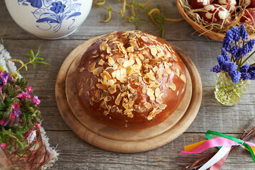 Mazanec, traditional Czech sweet Easter pastry, with spring flowers and Easter eggs