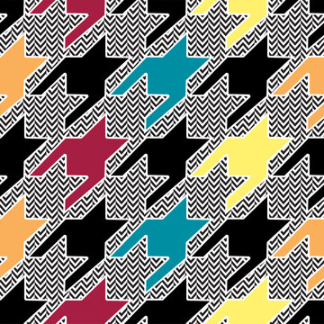 Colorful houndstooth pattern on chevron background. Trendy fabric swatch design.