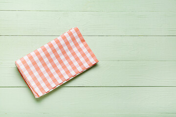 Obraz premium Clean napkin on color wooden background