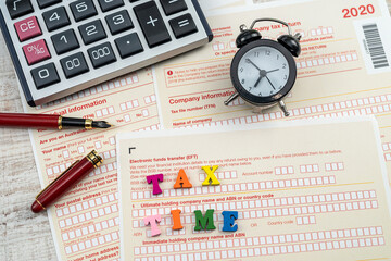 Clock with text tax timr on Australian Individual tax return form