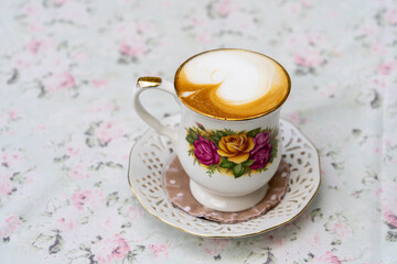 Vintage coffee cup on vintage table