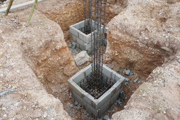 The concrete block formwork and reinforcement steel for the construction foundation or footing.