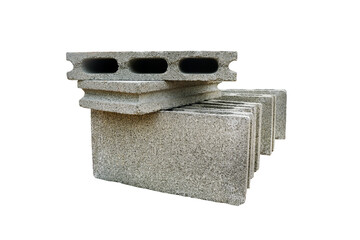 Isolated stacked three-hole rectangular concrete blocks cutout on white background. building materials.