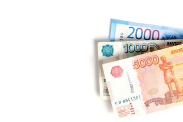 Banknotes Russian ruble in denominations one, two and five thousand rubles white background.