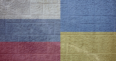 Image of flags of ukraine and russia on brick background