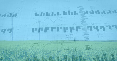 Image of financial data processing over wind turbines and landscape
