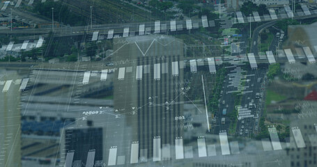 Fototapeta na wymiar Image of financial data processing over cityscape