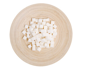 Fototapeta na wymiar Refined sugar in a wooden plate on a white background.