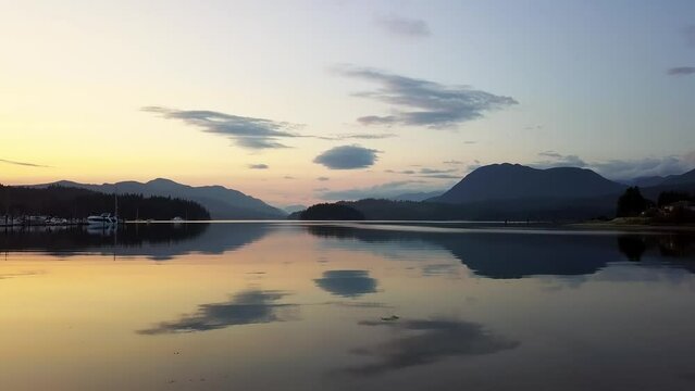 Aerial View Of Sunset Reflecting In The Tranquil Waters Of Sechelt Inlet In British Columbia, Canada.