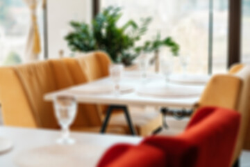 Cafe interior blurred background. Served table.
