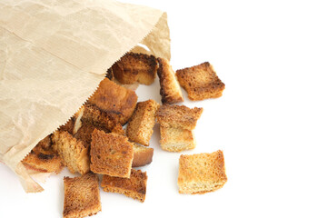 Fried breadcrumbs in a paper bag on a white background.Homemade food.