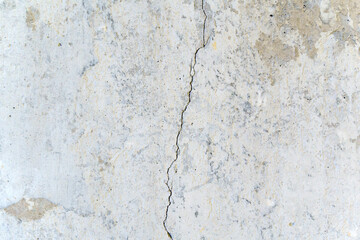 Crack on concrete wall texture, background, selective focus