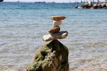 Balanced Zen stones by the sea. Concept of harmony, balance and meditation