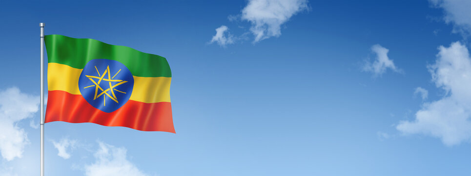 Ethiopian flag isolated on a blue sky. Horizontal banner
